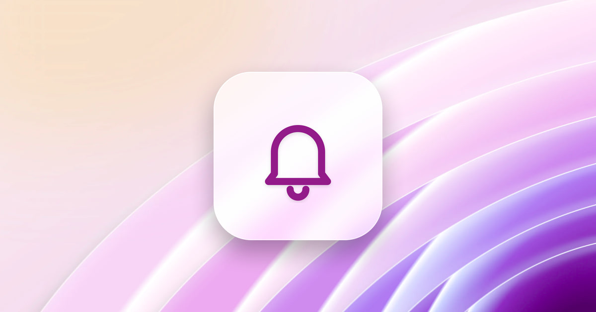 A bell on a frosted glass tile, over a lilac wallpaper.
