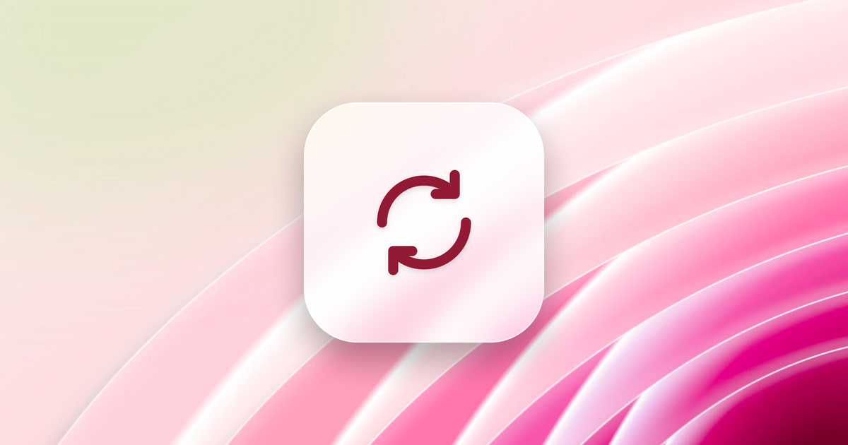 Two circular arrows on a frosted glass tile, over a rose wallpaper.